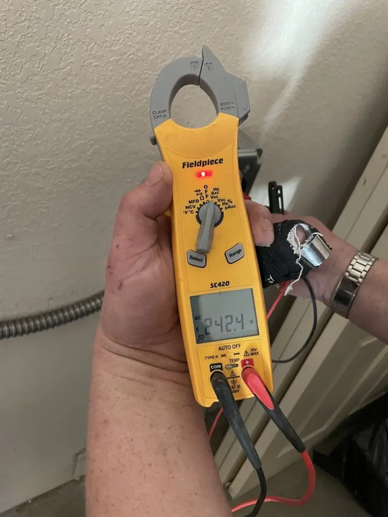 Voltage testing with clamp meter during Electrical Installation Services in Rehoboth